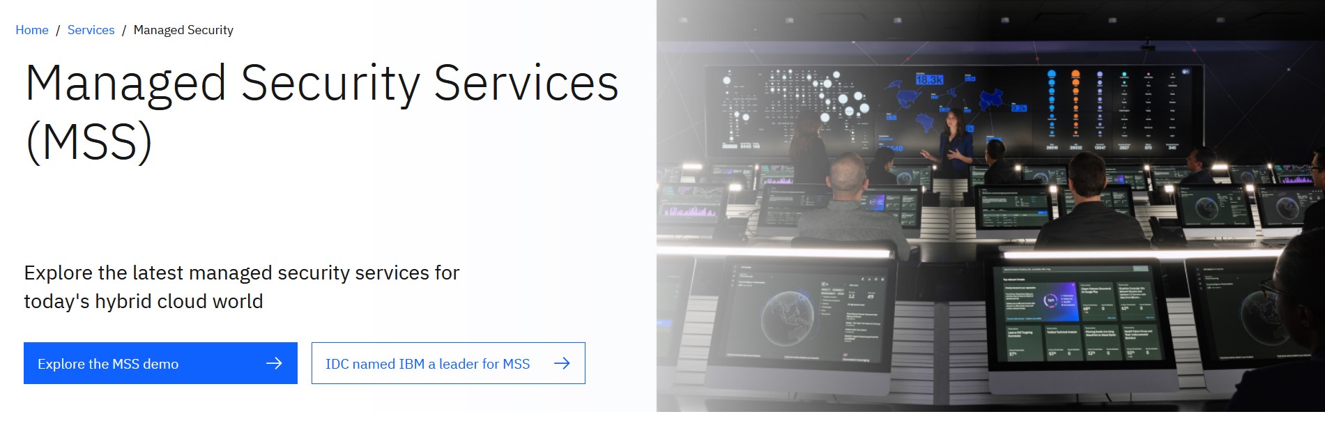 IBM Managed Security Services Image: A security operations center with multiple monitors and a large screen displaying data and analytics. The text "Managed Security Services (MSS)" is prominently displayed, along with a description of the latest managed security services for today's hybrid cloud world. Buttons for exploring the MSS demo and a mention of IDC naming IBM a leader for MSS are included.